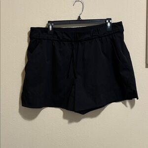 Lululemon Women’s Black Shorts with Slit Detail Size 16